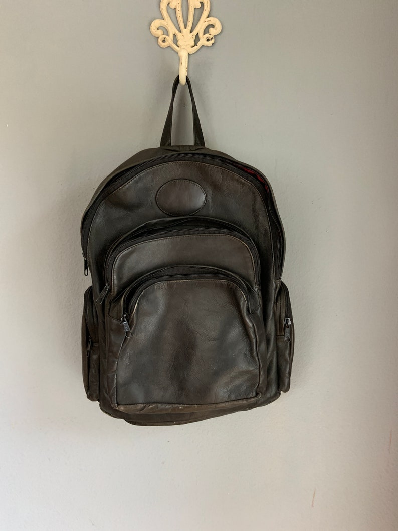 unisex scuffed burgundy interior masculine made in Canada Vintage black leather backpack thick leather organic lived in look