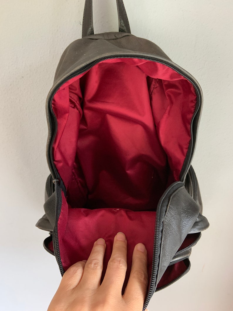 unisex scuffed burgundy interior masculine made in Canada Vintage black leather backpack thick leather organic lived in look