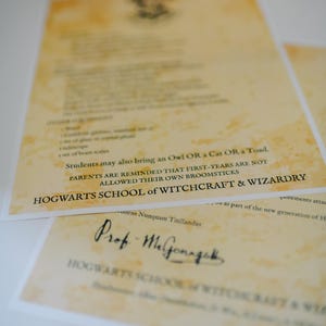May include: Two parchment-style documents with text from Hogwarts School of Witchcraft and Wizardry. The top document lists school supplies and rules. The bottom document is signed "Prof. McGonagall."