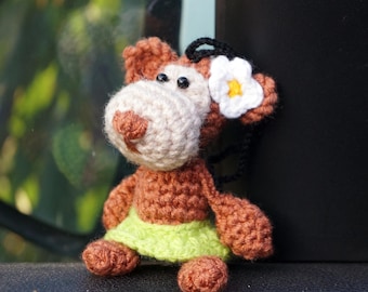 Adorno de mono para coche: Un divertido colgante para el espejo retrovisor.