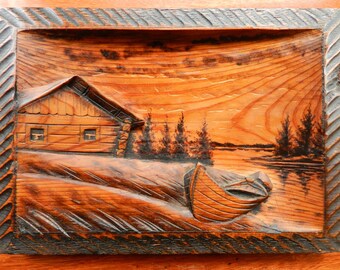 Hand-carved Finnish wooden wall hanging cabin in the woods / handmade 3D relief carving signed Kotka lake house with boat / Nordic folk art