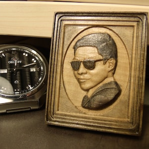 Miniportrait 3D on your photo.