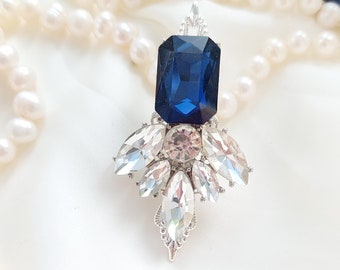 Princes cut sapphire blue hair clip.