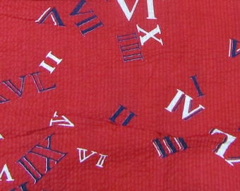 4.5 yards vintage red seersucker decorated with Roman Numerals