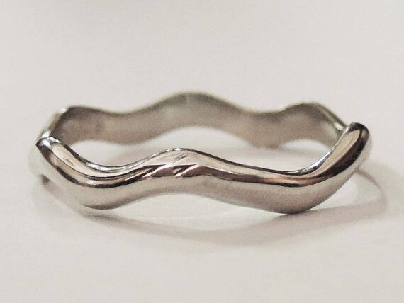 Curved cheap thumb ring