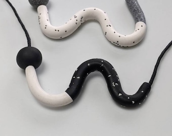 Handmade textured, monochrome, tube, polymer clay necklace