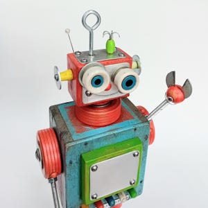 RICKIE. Found Object Art Sculpture.