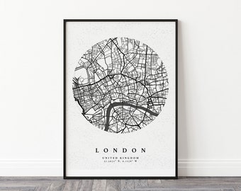 May include: Black and white map print of London, United Kingdom. The map is in a circle with the city name and coordinates below. The background is a white textured paper.