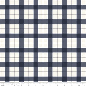May include: A white and navy blue gingham fabric with a repeating pattern of squares. The fabric is 12 inches wide and has a ruler marked in inches along the bottom.