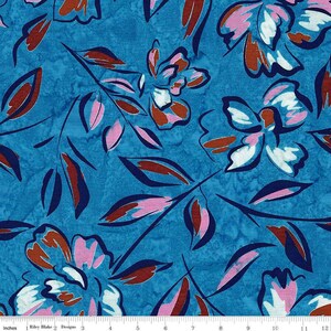 May include: A blue fabric with a repeating pattern of stylized flowers in shades of pink, white, and brown. The flowers are outlined in dark blue and have a watercolor effect.