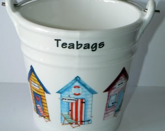 Beach hut teabag tidy Bucket, decorated with beach huts in choice of 2 sizes