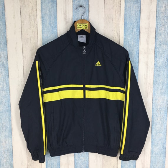 yellow adidas jacket with black stripes