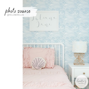 Wave pattern removable wallpaper in a costal interior design bedroom