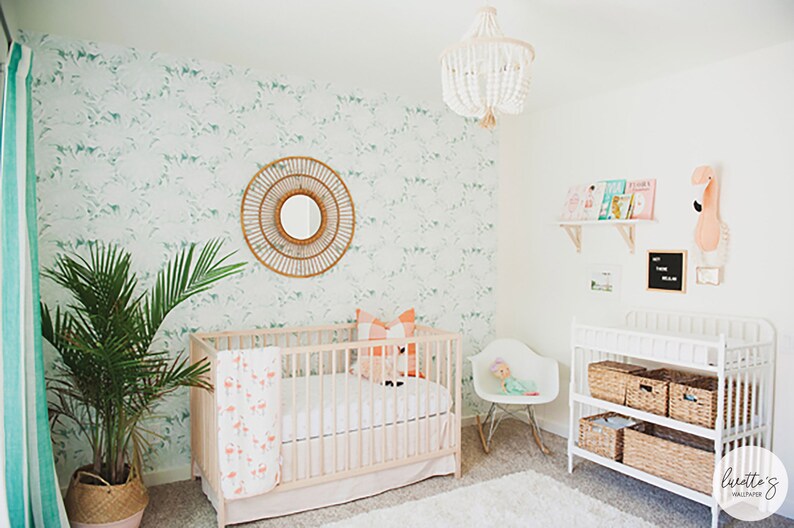 Green palm leaf removable wallpaper in a boho style nursery