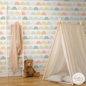 Colorful geometric cloud wallpaper in a bohemian interior design kids room