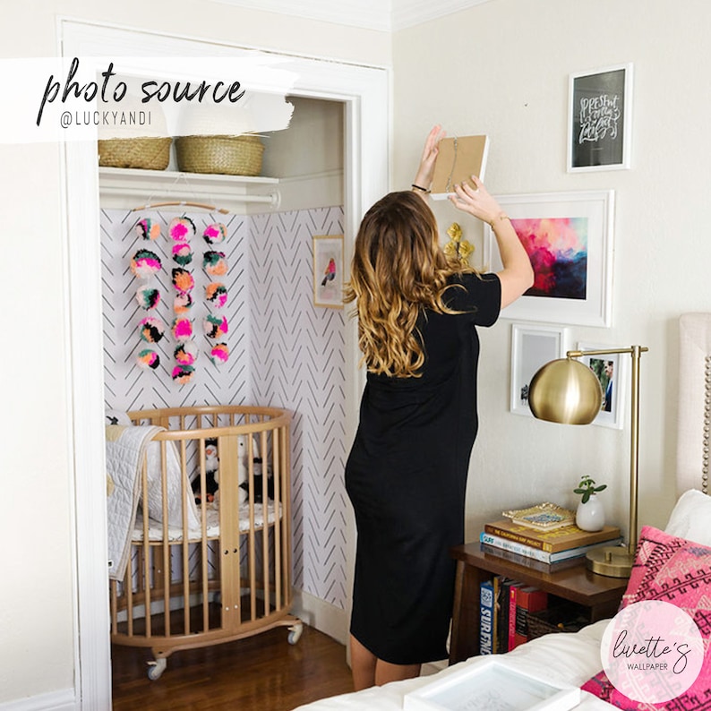 Simple herringbone removable wallpaper in a kids room