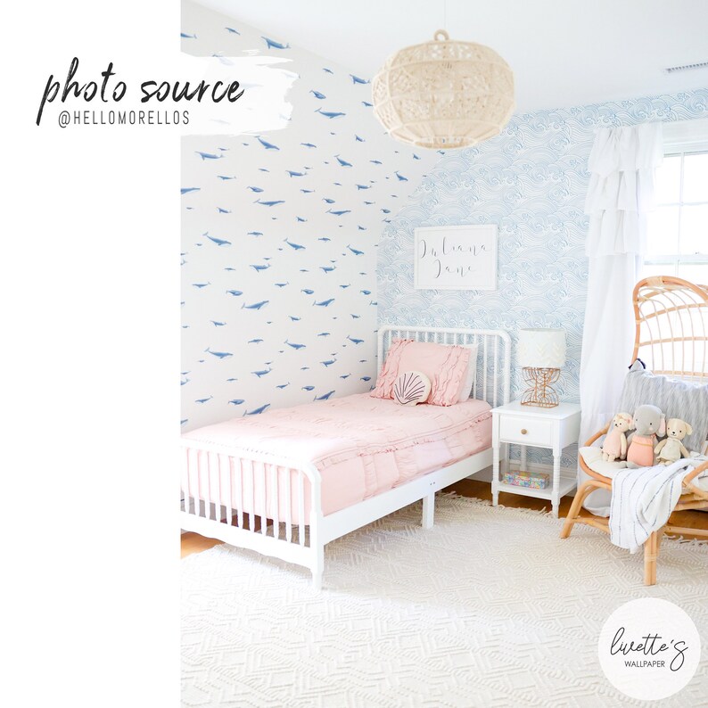 Blue wave pattern wallpaper in a kids bedroom setting