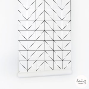 Panels of the geometric removable wallpaper in black and white