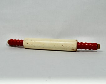 Vintage red handled rolling pin