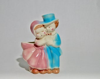 Vintage Mid-Century kitsch mini boy and girl planter
