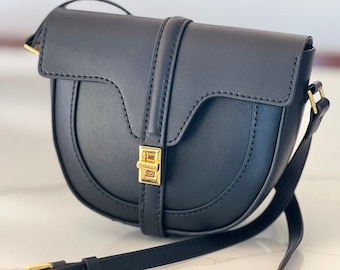 Black Leather Saddle Bag with Gold Accents