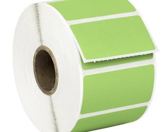 May include: A roll of green label stickers with white borders. The labels are rectangular and have a perforated edge.
