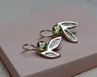 Earrings with leaves and bright green peridot,