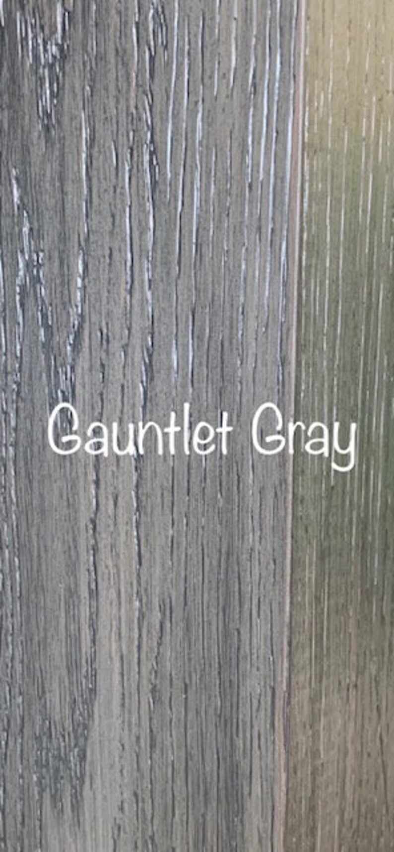 May include: Close-up of a wood grain texture painted in a gray color with the text "Gauntlet Gray" written in white.