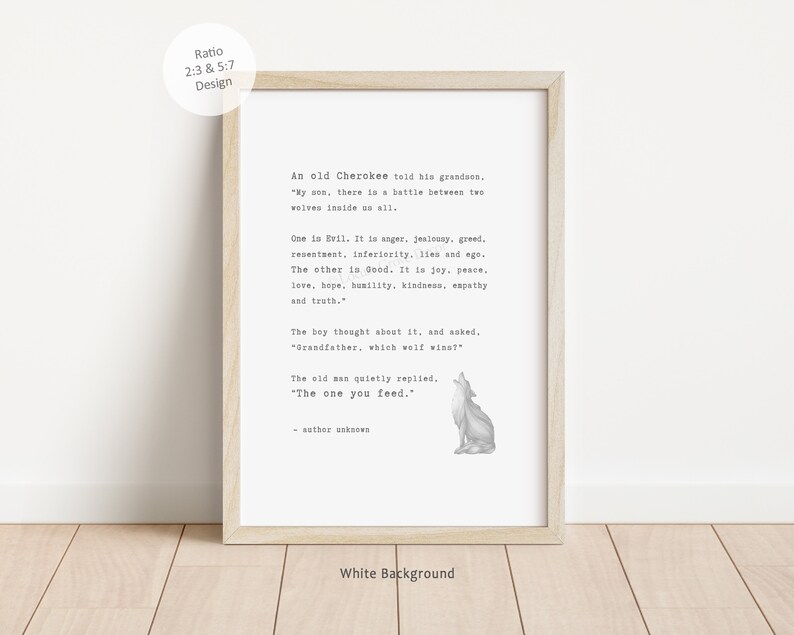 May include: A framed print with a white background and a light wood frame. The print features a quote about two wolves, with a small illustration of a howling wolf. The text includes the phrase "The one you feed."