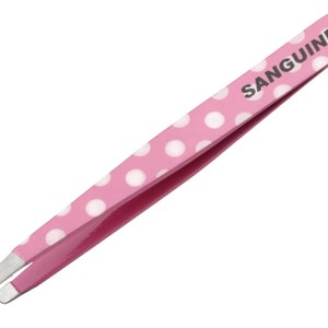 Puede incluir: Pinzas rosadas con lunares blancos y la palabra "SANGUINE" impresa en el mango.