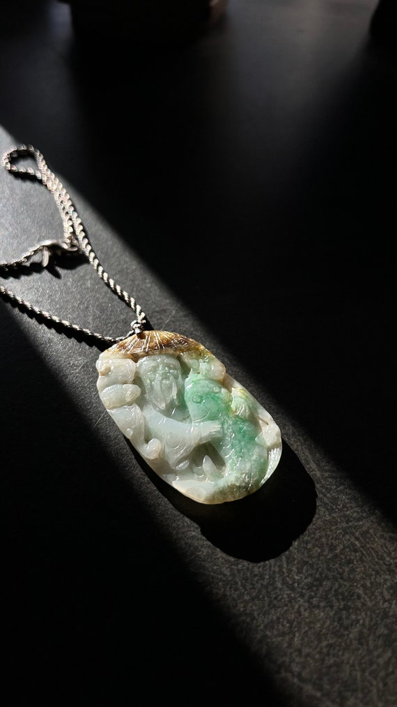 Finely carved Antique Jadeite Ornament from Qing D