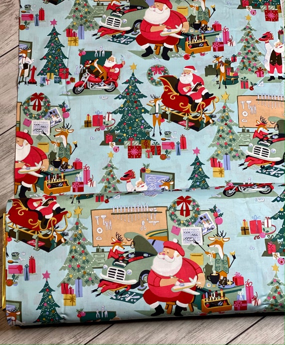 Santa's Garage in Wintergreen (Blue), By Alexander Henry, 8954B, 100% Cotton, sold by the 1/2 yard or the yard