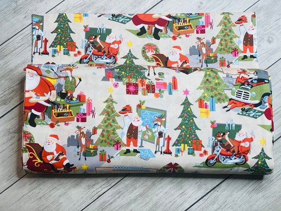 Santa's Garage in stone, By Alexander Henry, 8954A, 100% Cotton, sold by the 1/2 yard or the yard
