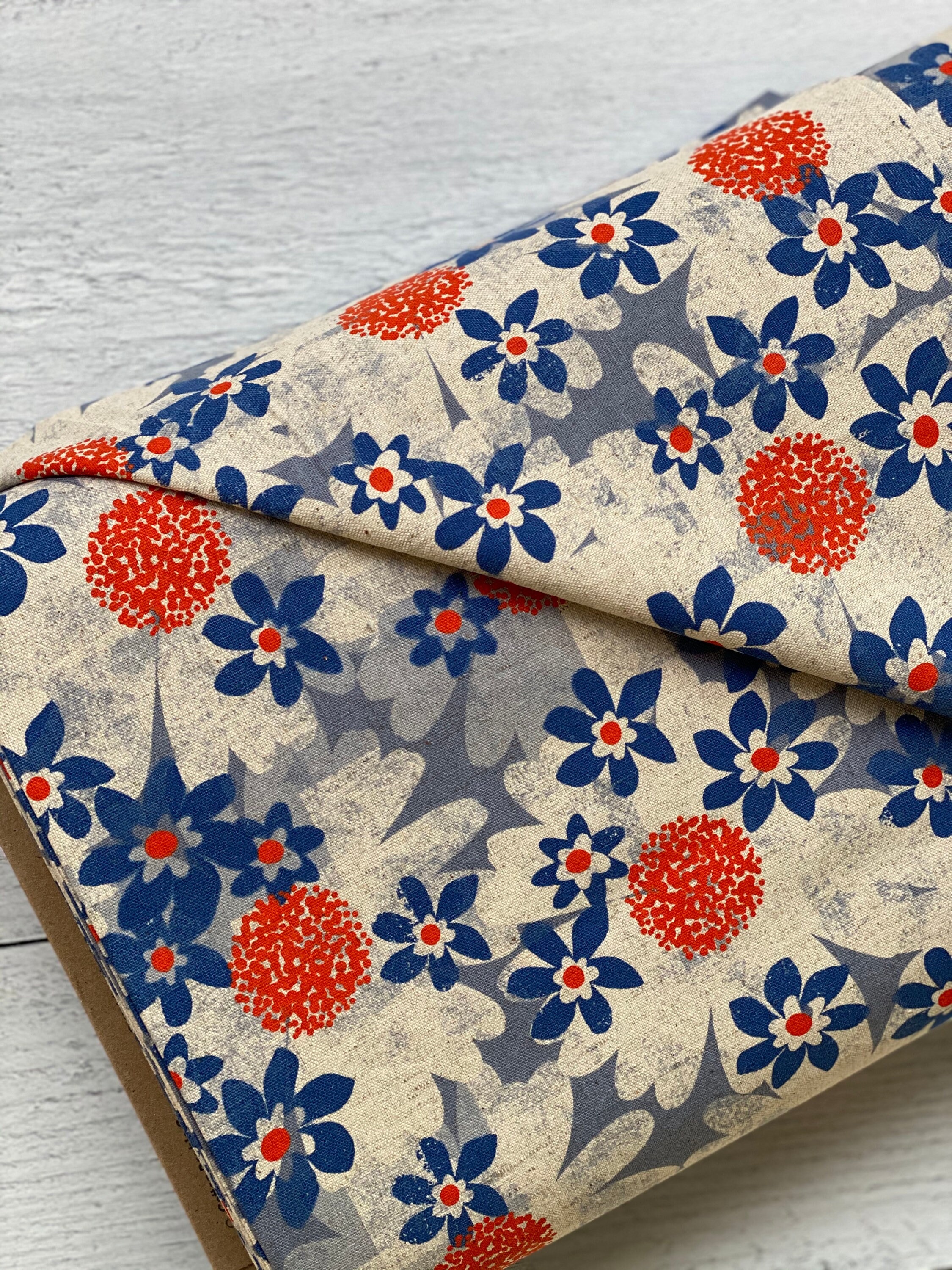 M0041022 Trinket Daisy Fields Blue Canvas Fabric, sold by the 1/2 yard