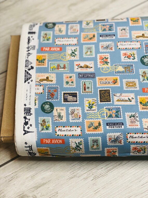 Bon Voyage, Postage Stamps, Blue Metallic Fabric, RP802-BL3M, By Rifle Paper Co, For Cotton + Steel, Sold by the 1/2 yard or the yard