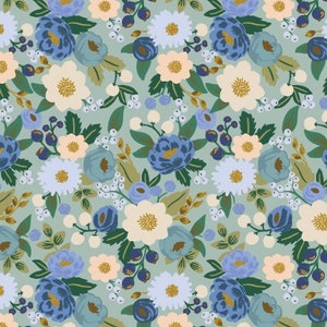 May include: A seamless pattern featuring a variety of blue, white, and yellow flowers on a light blue background. The flowers are arranged in a repeating pattern and are surrounded by green leaves and small white berries.