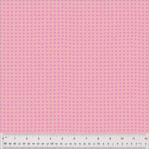 May include: Pink fabric with a repeating pattern of small, light purple dots. The dots are evenly spaced across the light pink background. A ruler is at the bottom of the image, with measurements in inches.
