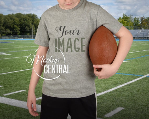 Boys Blank Gray Football T-Shirt Apparel Mockup Youth Sport Boys Blank Gray Football T-Shirt Apparel Mockup Youth Sport