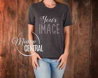 Download Free Blank Gray Women's T-Shirt Apparel Mockup, Fashion Design Styled Stock Photography, Girl's Grey Mock Up Shirt, Wood Background, JPG Download PSD Template