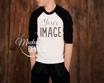 Boy's Blank White and Black Baseball T-Shirt Apparel Mockup, Fashion Design JPG Stock Photography, Youth Mock Up Shirt on Wood Background