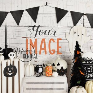 May include: Halloween themed decorations including a black and white striped pumpkin, a black and white skull, a white ghost, a black feather tree, a black and white sign that says "tricks & treats", and a white pumpkin with a black jack-o-lantern face.