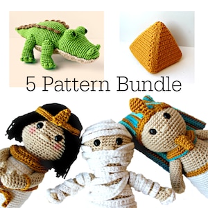 May include: A crochet pattern bundle featuring five amigurumi designs: a green crocodile, a yellow pyramid, a mummy, a pharaoh, and a queen. The bundle includes instructions for crocheting each character.