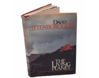 The Living Planet by David Attenborough, 1980s hardcover biology book, color nature photography, inspiration for the PBS television series