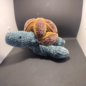 Crocheted turtle puzzle ball