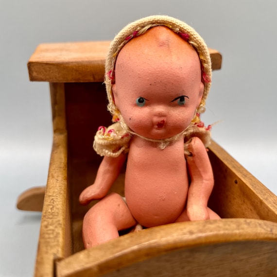 Baby doll rocking crib online
