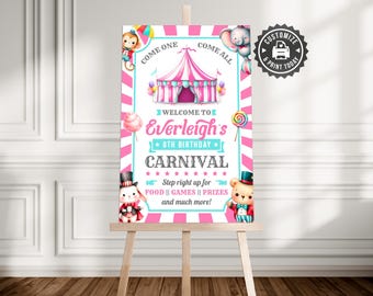 May include: A carnival-themed sign with a pink and white striped border. The sign says "Welcome to Everleigh's 8th Birthday Carnival" with cartoon animals and a circus tent illustration. The sign is displayed on a wooden easel.