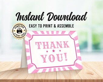 May include: Pink and white striped thank you card with the text "THANK YOU!" in a vintage circus font. The card is designed to be printed and assembled.