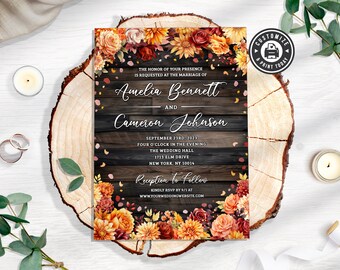 May include: A rustic wedding invitation with a woodgrain background and floral accents. The invitation features the names Amelia Bennett and Cameron Johnson, the date September 23rd, 2021, and the time four o'clock in the evening. The invitation also includes the location of the wedding, The Wedding Hall, 1713 Elm Drive, New York, NY 10014. The invitation concludes with the phrase "Reception to follow" and a request to RSVP by 9/1 at www.YOURWEDDINGWEBSITE.COM.