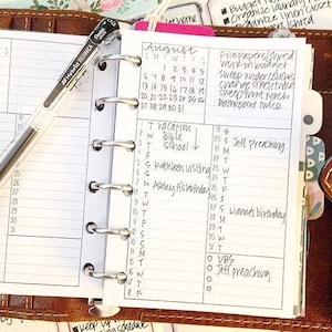 May include: A close-up of a monthly planner with a white background and black lines. The month of August is highlighted with the dates 1 through 31. The planner has a list of tasks and appointments for the month, including "Vacation, Bible School, Kathleen visiting, Ashley's birthday, Jeff preaching, Lianne's birthday, VBS, Jeff preaching".