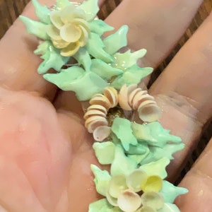 Vintage green and pink shell brooch
